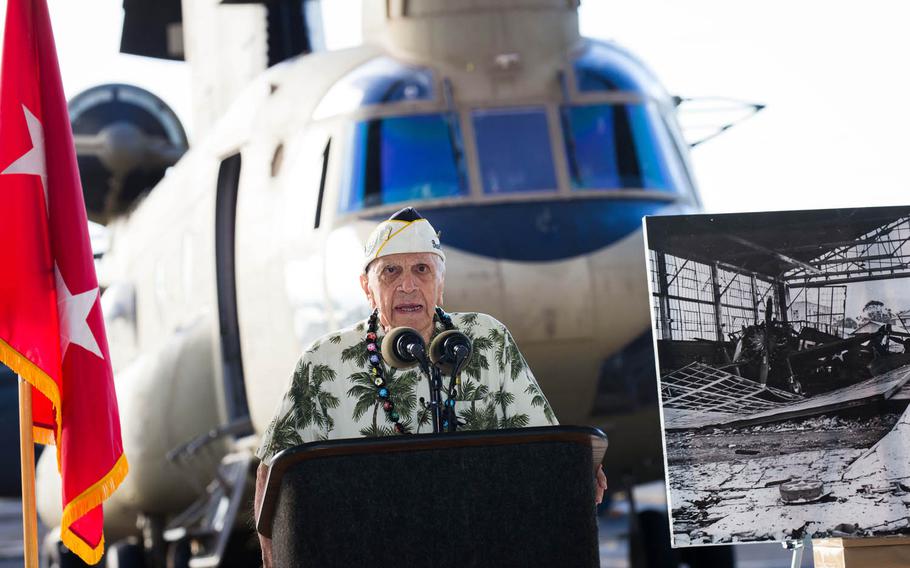 Thomas Petso, 93, shares his experience of the Japanese attack, during the Wheeler Army Airfield remembrance ceremony, Monday, Dec. 5, 2016. He and his fellow soldiers were playing football near Hangar 105 with Air Force friends when they saw the Japanese planes heading toward them.