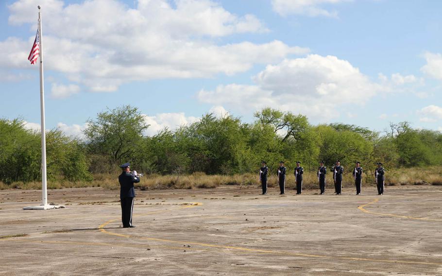 Taps is played at a ceremony Tuesday, Dec. 6, 1941, at Ewa Field recognizing the actions of Marines at the site during the 1941 surprise attack by the Japanese.
