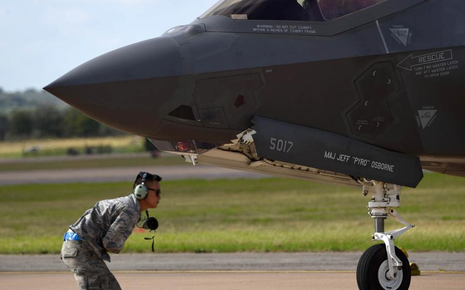 Senior Airman Saovada Pum, 33rd Aircraft Maintenance Squadron crew chief, ensures the area is clear before taxiing an F-35A Lightning II at Alliance Airport in Fort Worth, Texas, Oct. 17, 2016. The Air Force has named five installations as finalists to house the next two Air National Guard F-35A fighter squadrons.