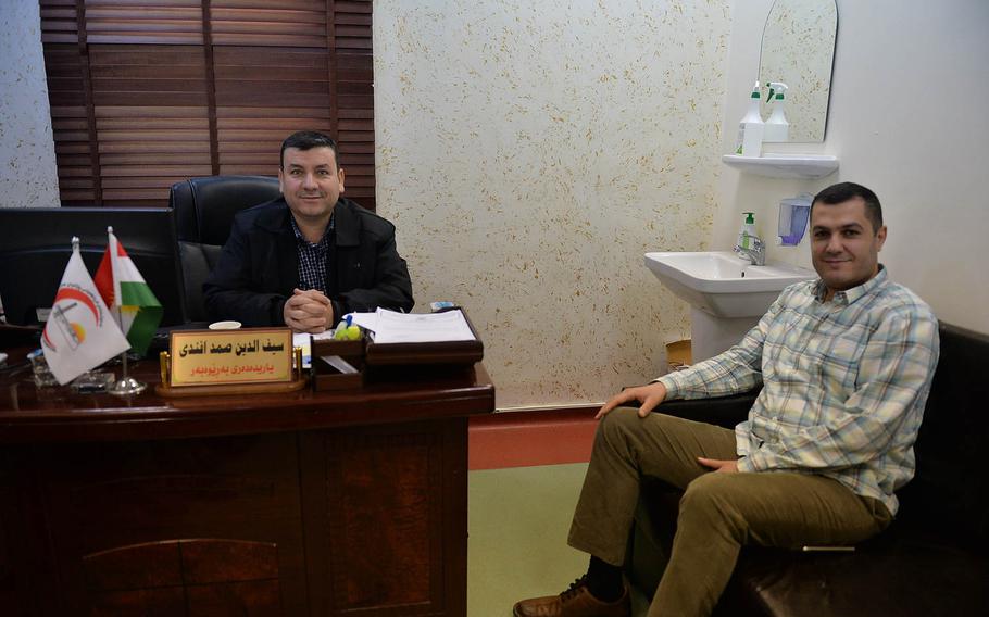 Saif Alden Samad, left, assistant general manager of the West Irbil Emergency Hospital, and orthopedic surgeon Dr. Hazhem Mama are pictured here at the hospital on Sunday, Nov. 20, 2016.