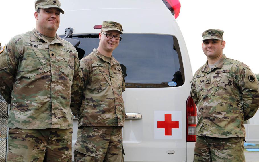I Corps Army Combat Medics Spc. Sandy Rushing, left, Pfc. Jonathan Fish, center, and Sgt. Mario Ratto jumped into action to save a local man's life while in Japan this month for annual Yama Sakura drills.