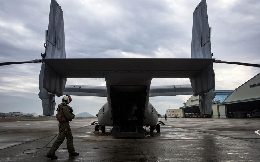 Sgt. Andrew Sturgress, an MV-22B Osprey tiltrotor aircraft crew chief assigned to Marine Medium Tiltrotor Squadron 262, 31st Marine Expeditionary Unit, conducts pre-flight inspections at Oruma Air Base, Nagasaki, Japan, in November.