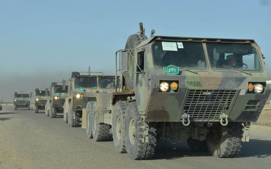 A convoy of military trucks on Nov. 21, 2016, traveling from Qayara Airfield West, Iraq, toward an area south of Mosul, where forces were battling Islamic State fighters as part of the campaign to retake Iraq's largest city.