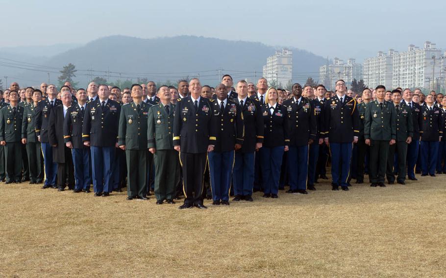 More than 5,000 soldiers led by Maj. Gen. Ted D. Martin, commanding general for the 2nd Infantry Division, re-create the division's insignia at Camp Casey, South Korea, Wednesday, Dec. 21, 2016. 