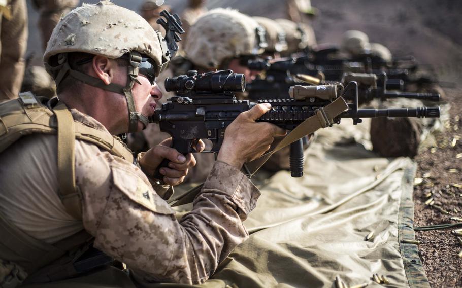 U.S. Marines with the 4th Marines, 11th Marine Expeditionary Unit, take part in an unknown distance range shoot as part of Exercise Alligator Dagger at Arta Beach, Djibouti on Dec. 12, 2016.
