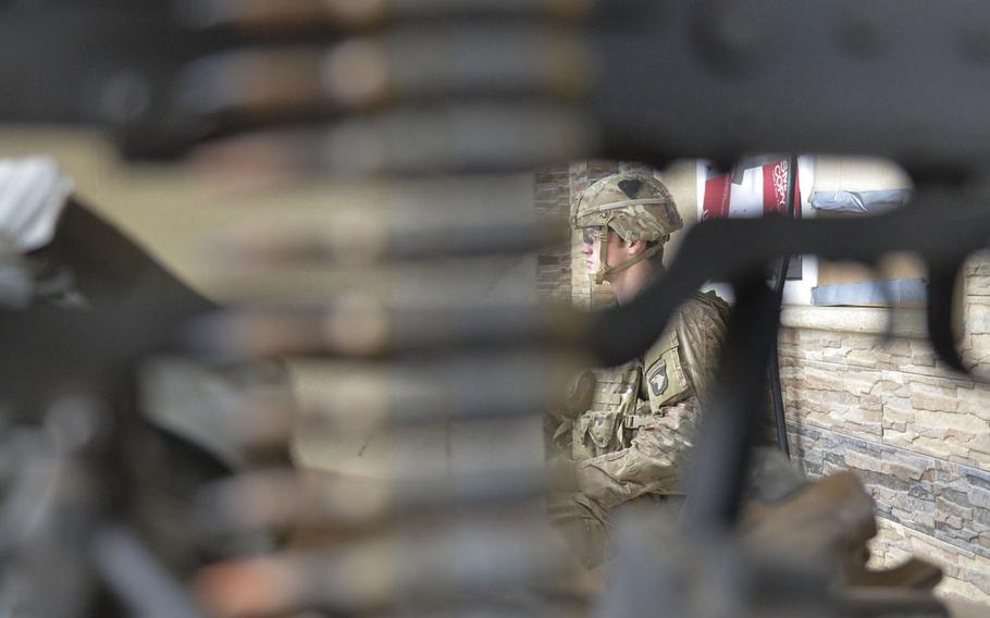 Spc. John Rhodes of Myrtle Point, Ore., is pictured Wednesday, Dec. 28, 2016, serving watch duty at a safe house near the forward line of troops in the battle for Mosul, Iraq. Rhodes is one of the soldiers of Apache Company, 1st Battalion, 26th Infantry Regiment helping secure a tactical base where coalition forces assemble.