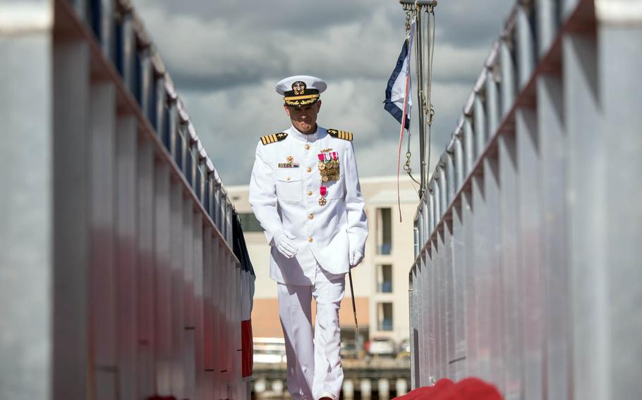 Capt. Timothy Rexrode, outgoing commander of Submarine Squadron 1, is pipped ashore after a change-of-command ceremony at Joint Base Pearl Harbor-Hickam, Hawaii, Thursday, Jan. 5, 2017.