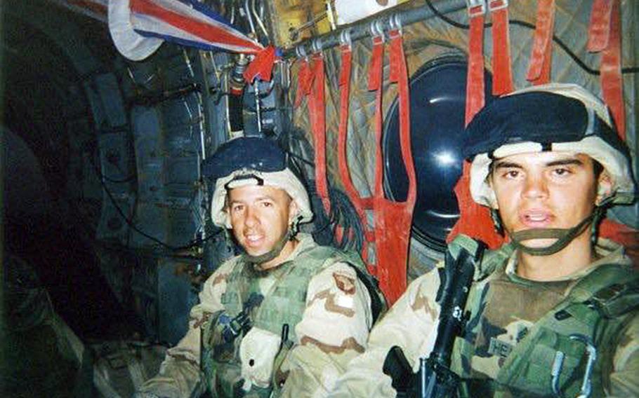 Sgt. 1st Class Eric Geressy and Staff Sgt. Scott Heaward air assault from Baghdad to Sinjar, Iraq, in 2003. Geressy, a retired Army sergeant major, went to Mosul as a platoon sergeant when the city was under the control of the 101st Airborne Division, commanded by then Maj. Gen. David Petraeus, in October 2003.