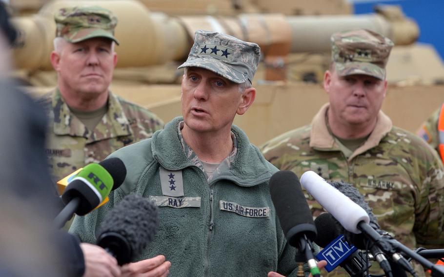 Maj. Gen. Timothy McGuire, left, the deputy commander of U.S. Army Europe, and Maj. Gen. Duane Gamble, commander of the 21st Theater Sustainment Command, listen as deputy U.S. European Command commander Lt. Gen. Timothy Ray speaks to the media at the port of Bremerhaven, Germany, on Sunday, Jan. 8, 2017. The trio was at the port to watch equipment of the 3rd Armored Brigade Combat Team, 4th Infantry Division be unloaded. The unit is heading to Poland for a nine-month rotation as part of Operation Atlantic Resolve.