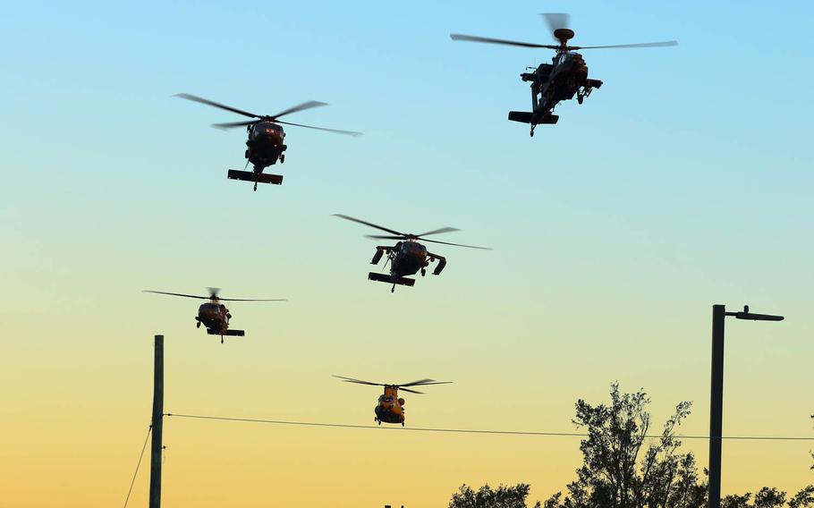 An AH-64D Apache leads a helicopter formation flight over Fort Bragg, N.C., Nov. 22, 2016. U.S. Forces Korea will deploy 24 Apache helicopters to South Korea as the allied forces face a growing threat from the North.