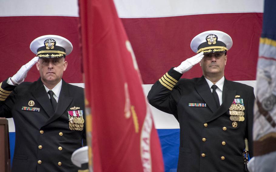 Capt. George Doyon, right, relieved Capt. Marvin Thompson, left, as commander of Amphibious Squadron 11 during a change-of-command ceremony aboard the USS Bonhomme Richard in Sasebo, Japan, Monday, Jan. 9, 2017.