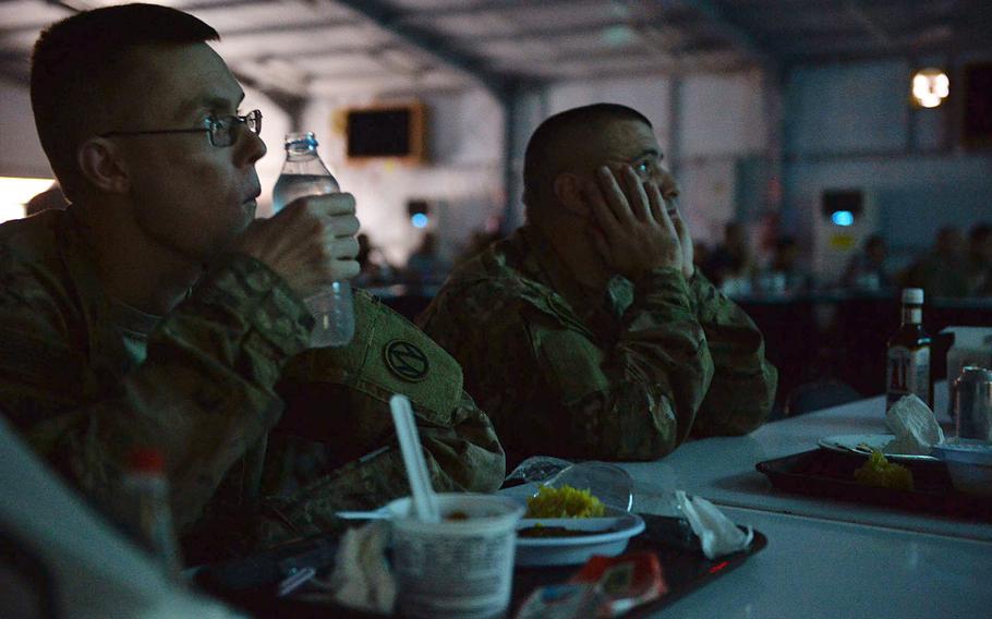 Staff Sgt. Jonathan Broyles, left, and Staff Sgt. Brandon Lund watch ''Rogue One: A Star Wars Story'' during a special screening for U.S. and coalition troops at Irbil International Airport in Iraq on Jan. 6, 2017. Troops said the showing breaks up the monotony of life on deployment and gives them a chance to talk about something other than work with family back home.