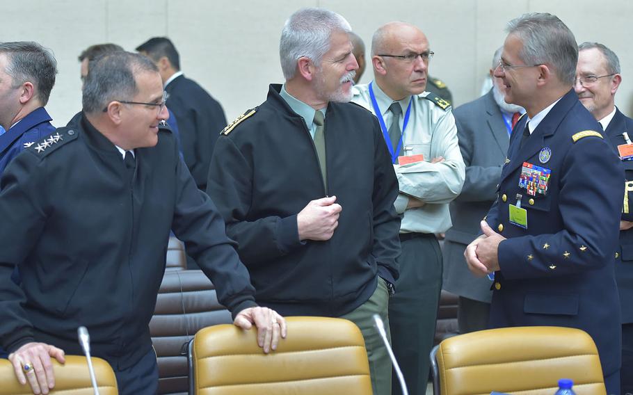 Gen. Curtis Scaparrotti, Supreme Allied Commander Europe, left; Czech Gen. Petr Pavel, chairman of the NATO Military Committee; and French Gen. Denis Mercier, Supreme Allied Commander Transformation, speak at NATO headquarters in Brussels, Tuesday, Jan. 17, 2017.