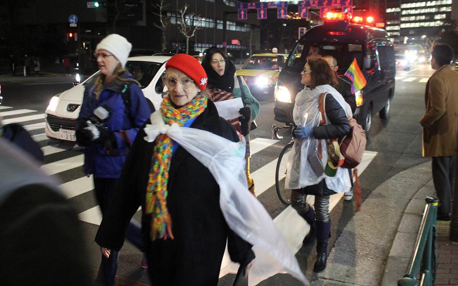 Linda Crawford marches during the Women's March in Tokyo on Jan. 20, 2017.