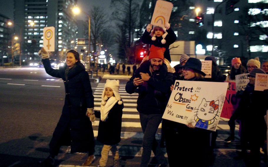 Families and children were amongst the participants of the Women's March in Tokyo on Jan. 20, 2017.