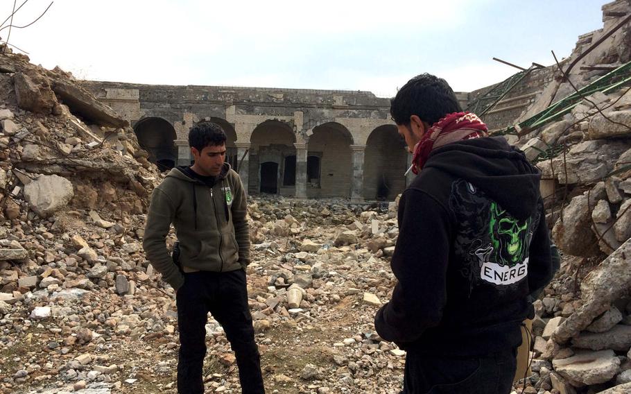 Iraqi special forces troops at the ruins of the recently liberated Nabi Yunus Mosque, also known as the "Tomb of Jonah," in Mosul, Iraq, on Saturday, Jan. 21, 2017. The mosque was blown up by Islamic State militants. 