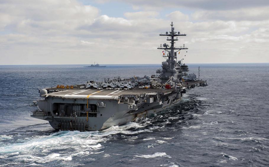 The aircraft carrier USS George H.W. Bush sails through the Atlantic Ocean, Dec. 8, 2016. Bush's strike group deployed on Saturday, Jan. 21, 2017, to the 5th Fleet and 6th Fleet areas of operations to support the air campaign against the Islamic State group. 