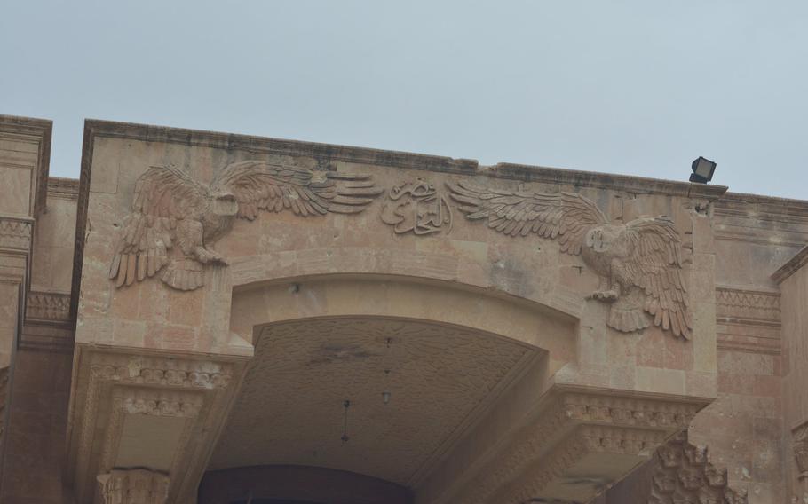 Damage done by the Islamic State group to a palace overlooking the Tigris River in Mosul, Iraq.