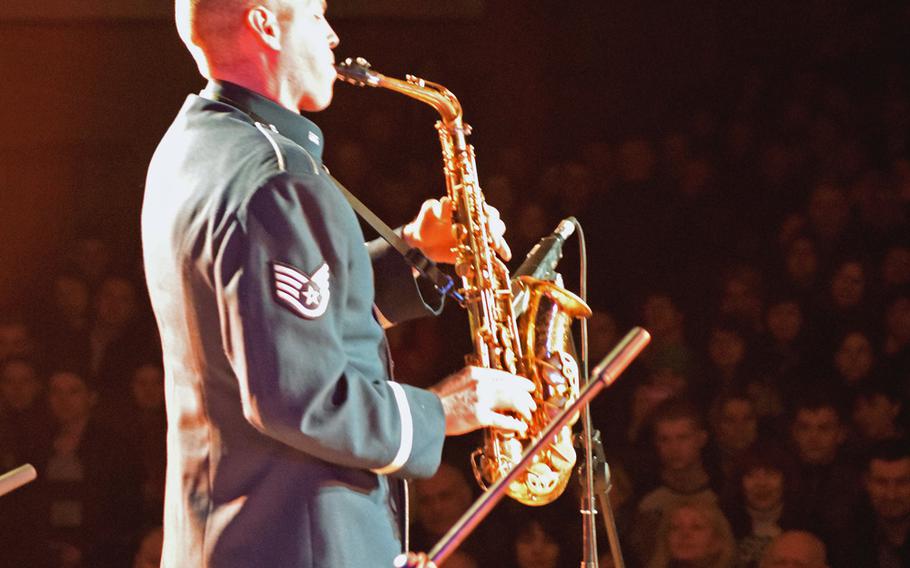 Staff Sgt. Brian Connelly plays a saxophone solo during a performance at the Kropyvnytskyi Aviation Academy in Kropyvnytskyi, Ukraine, March 25, 2017. U.S. Air Forces in Europe's jazz band played for nearly 600 people at the civilian flight school.