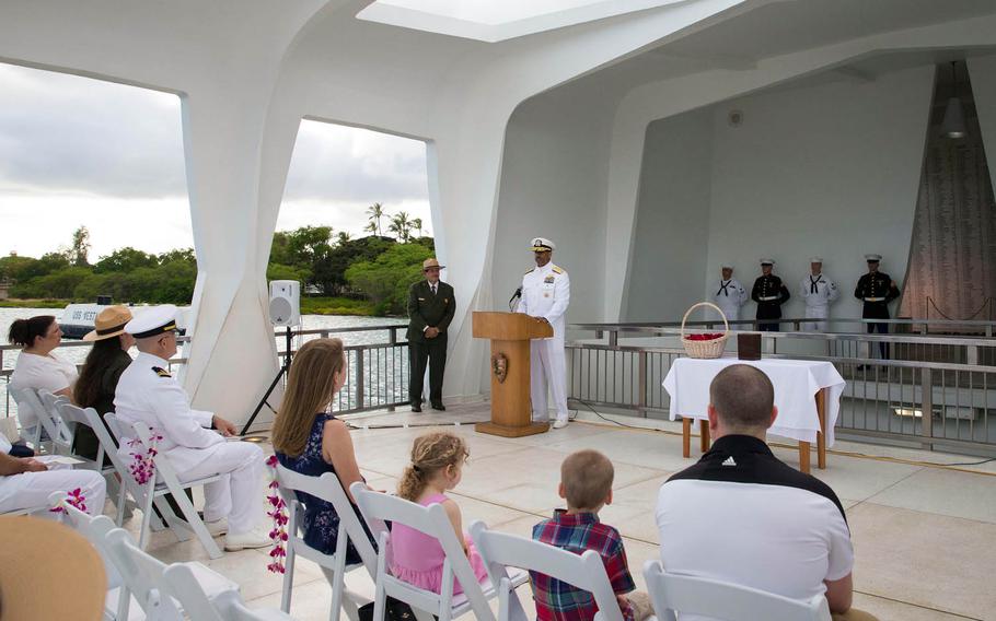 Rear Adm. John Fuller, of Navy Region Hawaii, speaks at the USS Arizona Memorial during the interment ceremony of Pearl Harbor survivor Raymond Haerry, Saturday, April 15, 2017.