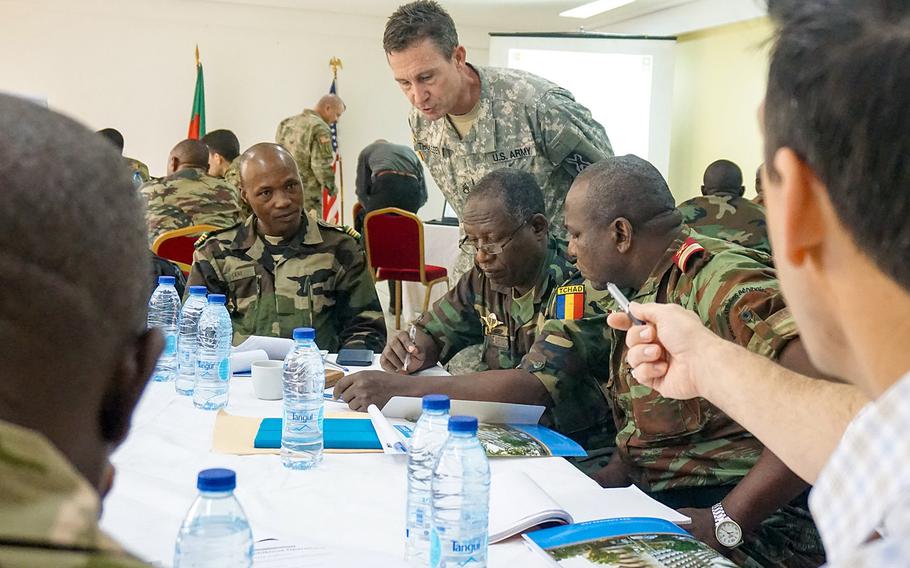 Planners discuss the details of each exercise scenario during the Unified Focus 2017 final planning event in Douala, Cameroon, Feb. 6, 2017. The UF17 FPE brought partner nation planners together to discuss and shape the inaugural Unified Focus exercise designed to enhance and enable Lake Chad Basin Commission nations to support the Multinational Joint Task Force counter-Boko Haram operations.