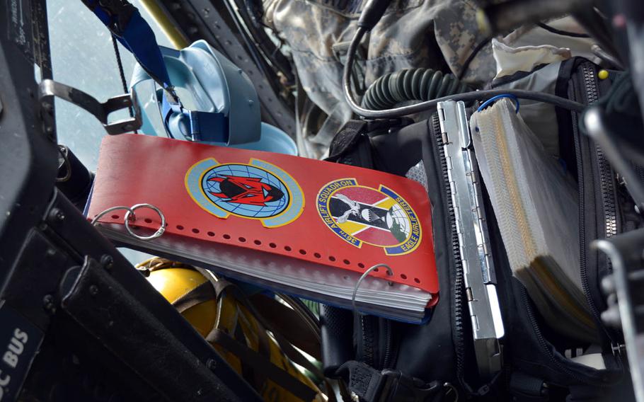 Log books inside a C-130H aircraft flying over Japan, Thursday, April 20, 2017.