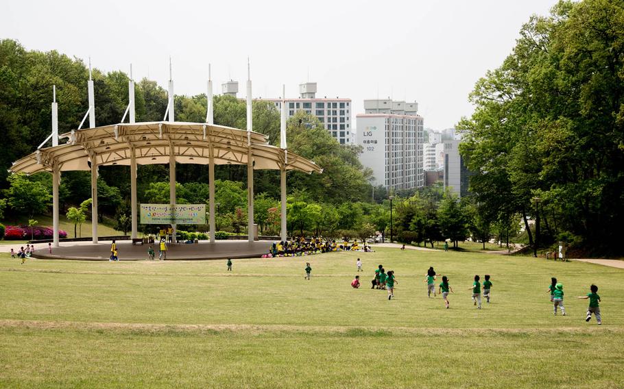 South Korean children enjoy a field trip to the park minutes outside of Osan Air Base, South Korea, a presumed ground zero for rocket attacks in case of a war with the North, Tuesday, May 2, 2017.