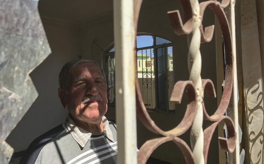 Salim Petrus Jeju, 74, is pictured in his home in the Iraqi village of Batnaya on March 24, 2017. Jeju lived in the home during Islamic State's occupation of the village north of Mosul and said he hoped the terrorist group would be destroyed.