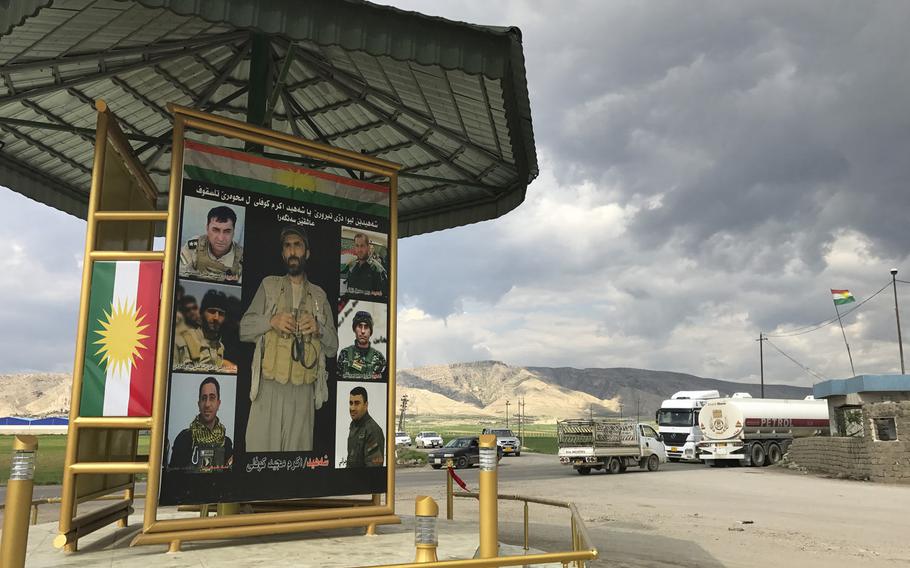 Pictured here on March 24, 2017, a memorial near the Iraqi village of Alqosh honors the martyrs of the Kurdish forces, known as peshmerga, who died near here while battling Islamic State militants. ISIS stormed the nearby city of Teleskof in May 2016, killing a U.S. Navy SEAL who was helping to evacuate U.S. advisers from the area.