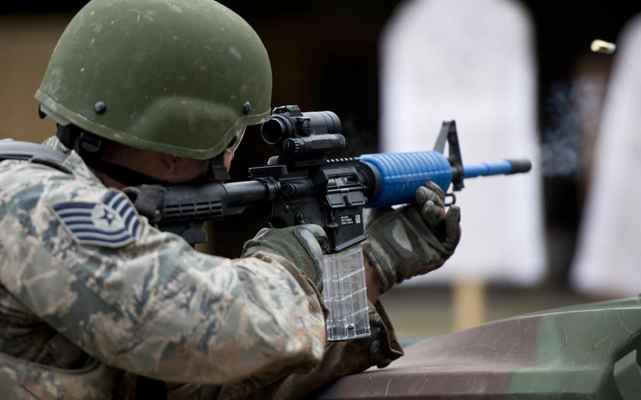 Tech. Sgt. Daniel Brown, from the 435th Construction and Training Squadron, fires at a target during the 435th Contingency Response Group Olympics at Ramstein Air Base, Germany, on Friday, May 5, 2017.