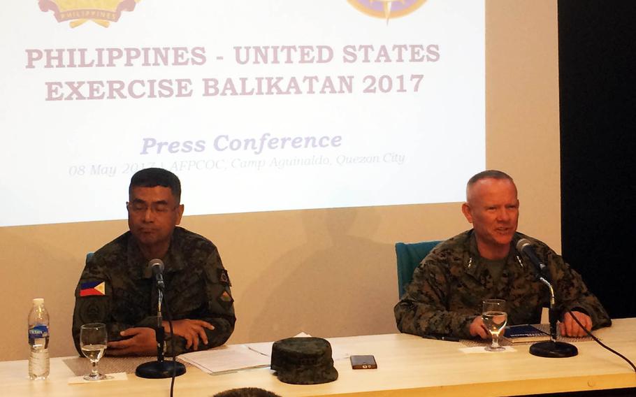 The directors of the Balikatan military exercise, Philippine army Lt. Gen. Oscar Lactao and III Marine Expeditionary Force commander Lt. Gen. Lawrence Nicholson, gave upbeat answers to reporters' questions about the drills at Camp Aguinaldo, Philippines, Monday, May 8, 2017.