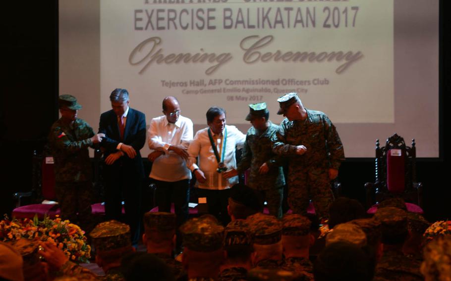U.S.and Philippine troops and military and civilian leaders kick off the annual Balikatan exercise at Camp Aguinaldo, Philippines, Monday, May 8, 2017.