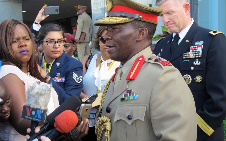 Gen. Griffin Spoon Phiri, commander of the Malawi Defense Forces, and Maj. Gen. Joseph Harrington, commander of U.S. Army Africa, speak to journalists on the first day of the African Land Forces Summit in Lilongwe, Malawi, on Monday May 8, 2017. The summit hosted by U.S. Army Africa seeks to develop cooperation and closer military ties on the African continent.