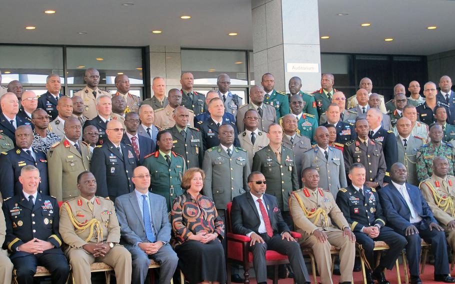 African army chiefs, U.S. generals, the U.S. ambassador to the African Union and the vice-president of Malawi, all on hand for the first day on Monday, May 8, 2017, of the African Land Forces Summit, pose for a photo. The summit hosted by U.S. Army Africa seeks to develop trust, cooperation and friendly military relationships on the African continent.