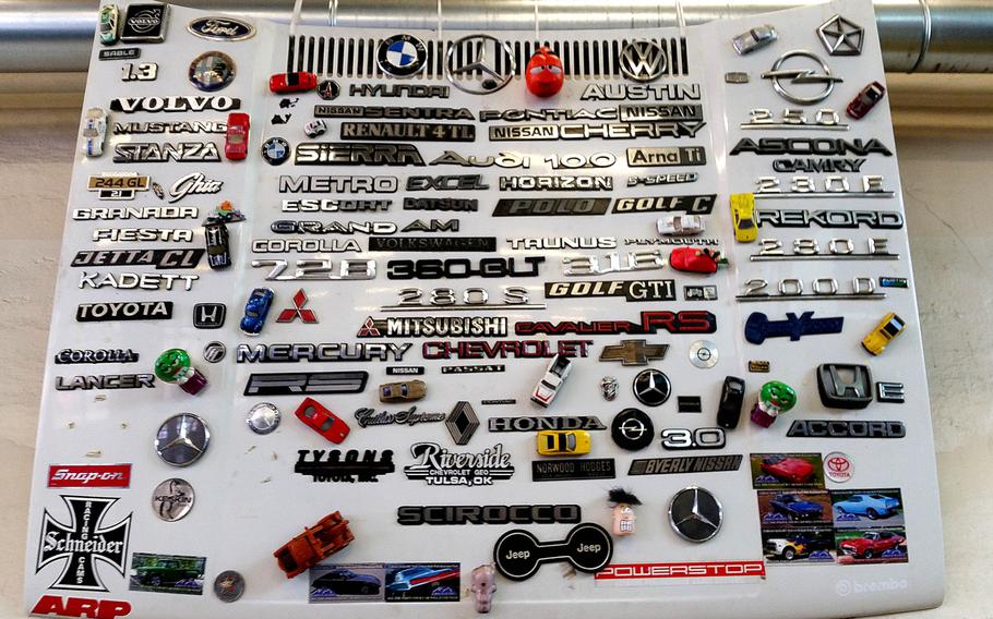 A collection of hood ornaments is on display at the auto hobby shop on Pulaski Barracks, Germany, April 18, 2017.