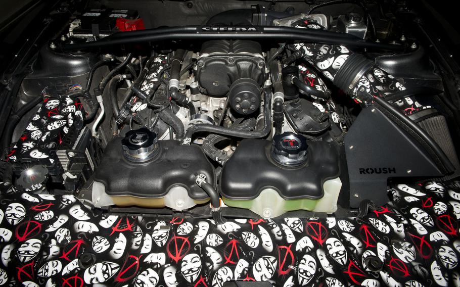 An engine cover on a souped-up Ford Mustang at Ramstein Air Base, Germany, April 25, 2017.