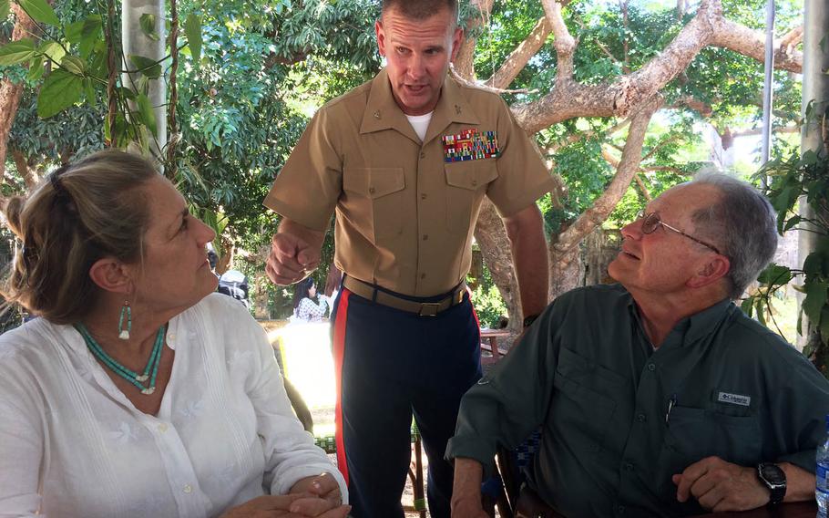 Col. Kevin Norton, center, 4th Marine Regiment commander, speaks with Sandra Harding, whose mother and father were prisoners of war in the Philippines during World War II, and Dennis Scheuermann, who was born in a Japanese POW camp on the island nation, Saturday, May 6, 2017, in Corregidor, Philippines.