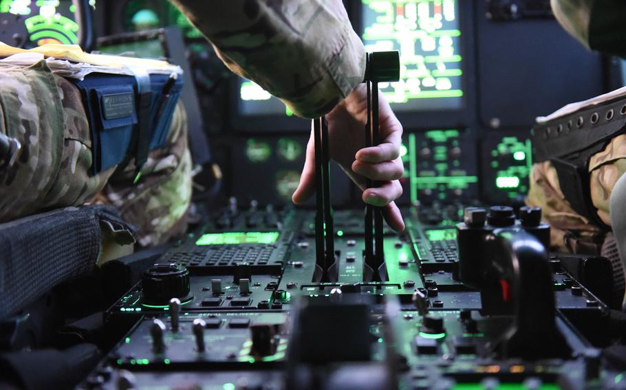 Maj. Timothy Fast, 34, of Baltimore, Ohio, prepares to take off from Bagram Air Field, Afghanistan, May 4, 2017.