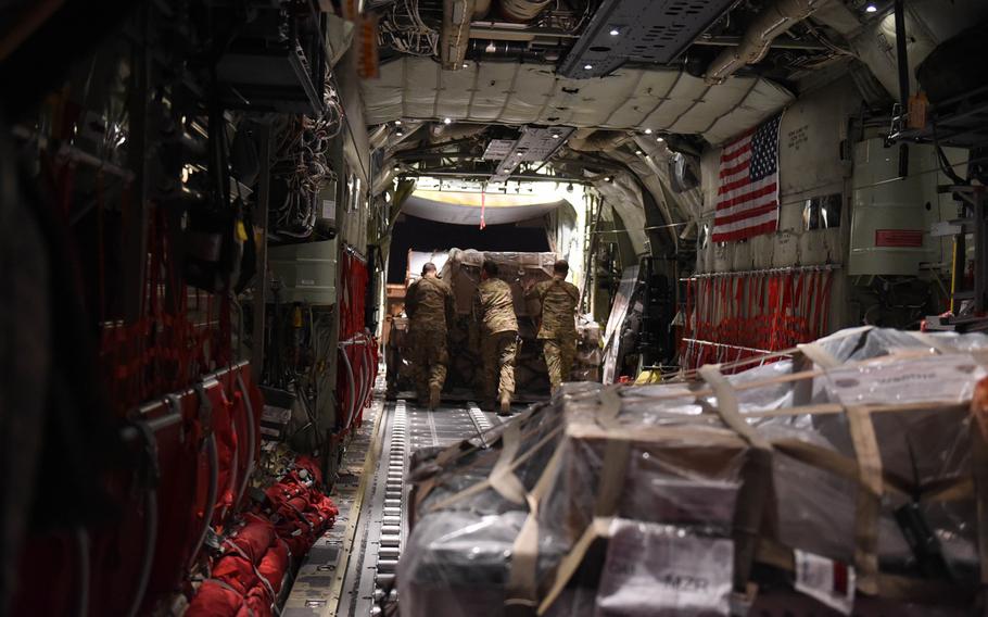 A C-130J crew from the 774th Expeditionary Airlift Squadron offloads cargo at Mazar-e-Sharif, Afghanistan, May 4, 2017.