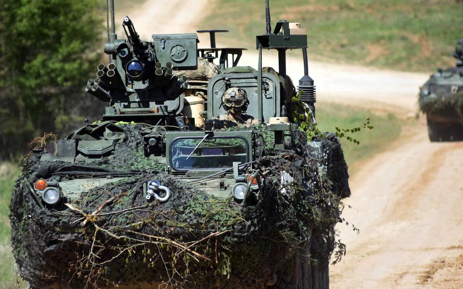 American soldiers speed toward their objective in a Stryker during Exercise Saber Junction in Hohenfels, Germany, Wednesday, May 10, 2017.