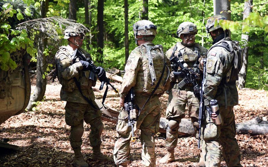 American, Polish and British soldiers train in Hohenfels, Germany, during Exercise Saber Junction, Wednesday, May 10, 2017.