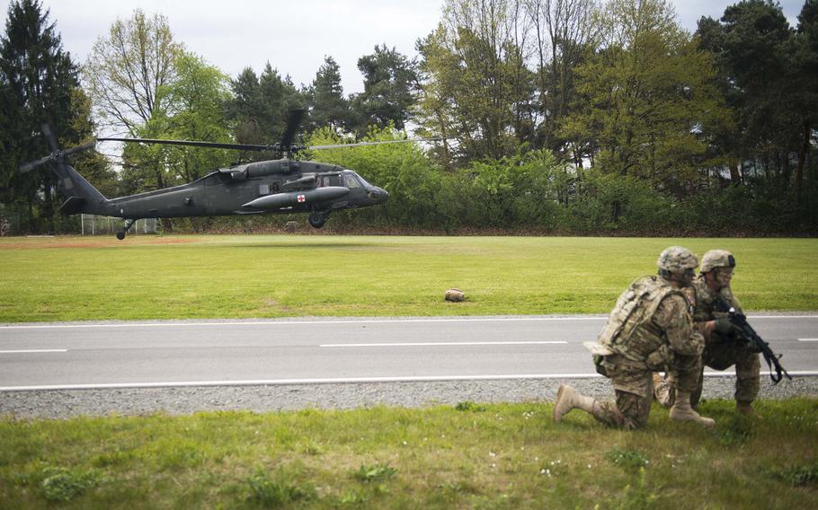 A U.S. Army Black Hawk helicopter from the 12th Combat Aviation Brigade lands during a casualty evacuation exercise at Rhine Ordnance Barracks, Germany, on Thursday, May 11, 2017. The exercise was part of the 10th Army Air and Missile Defense Command's 5th Battalion, 7th Air Defense Artillery Regiment External Evaluation.