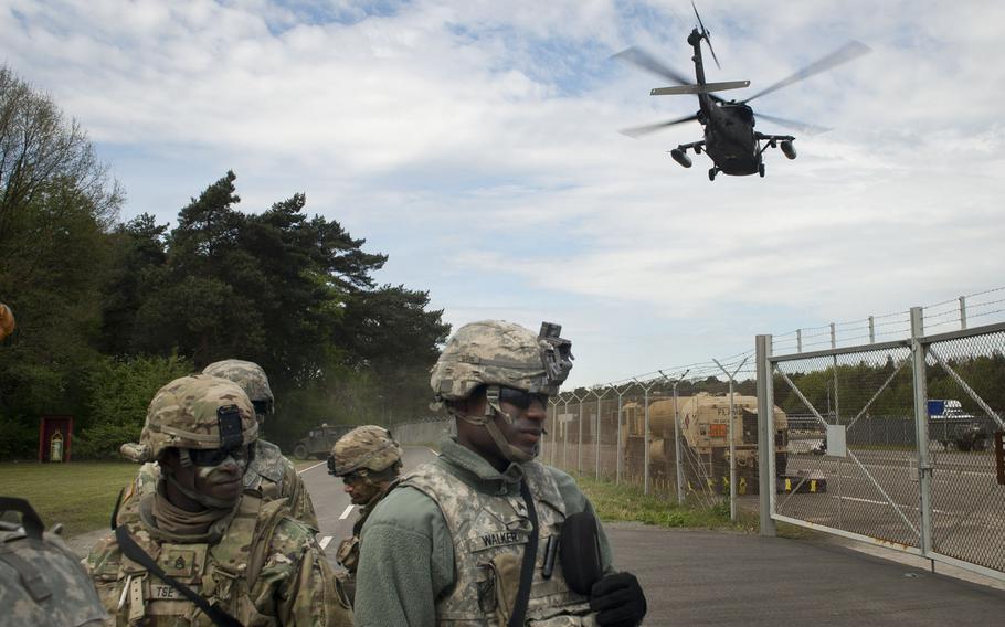 A 12th Combat Aviation Brigade Black Hawk helicopter transports simulated casualties during an exercise at Rhine Ordnance Barracks, Germany, on Thursday, May 11, 2017.