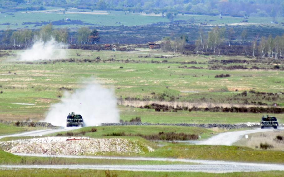 French tankers firing on targets in Leclerc tanks during the Strong Europe Tank Challenge at Grafenwoehr, Germany, Thursday, May 11.