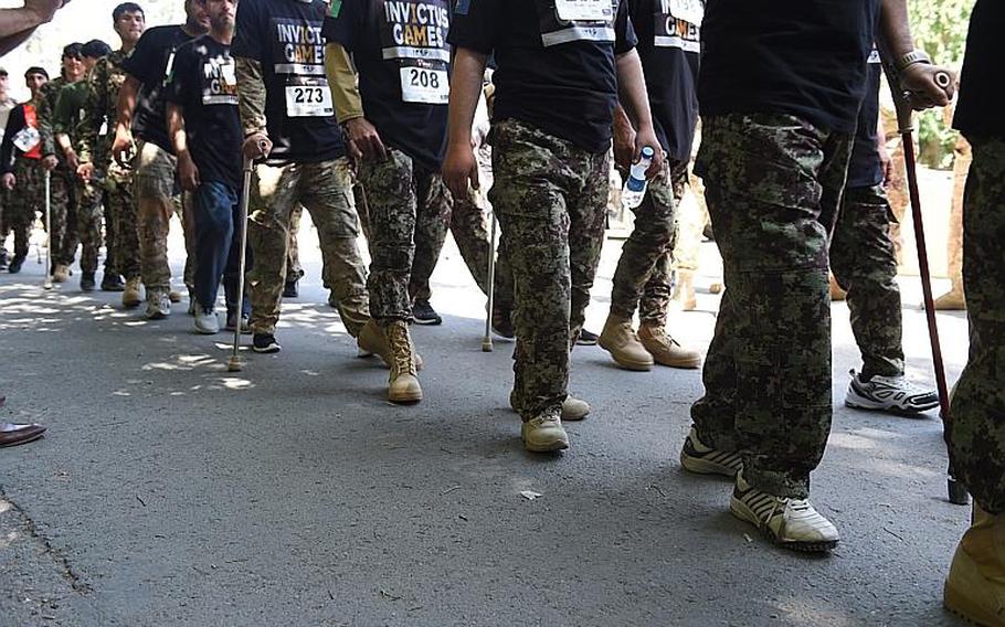 Wounded Afghan soldiers arrive at Resolute Support headquarters in Kabul, Afghanistan, May 13, 2017, to compete for a chance to participate in the Invictus Games in Toronto in September.