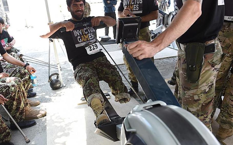 A wounded Afghan soldier competes on a rowing machine for a chance to join Afghanistan?s team for the 2017 Invictus Games, at Resolute Support headquarters in Kabul, Afghanistan, Saturday, May 13, 2017.
