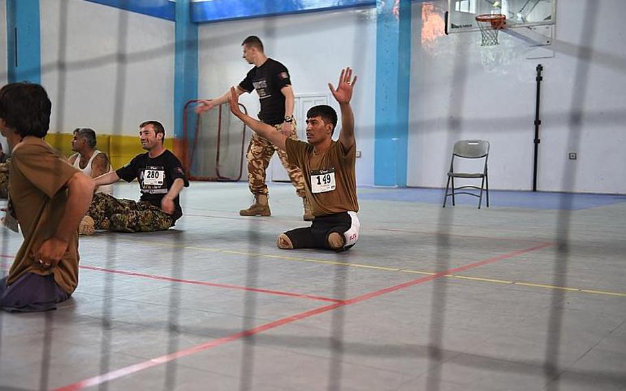 Nasir Ahmad, 27, who lost his legs after stepping on an IED in Helmand in 2015, competes for a slot on Afghanistan?s team for the 2017 Invictus Games,at Resolute Support headquarters in Kabul, Afghanistan, Saturday, May 13, 2017. Later that afternoon, he found out would be headed to the games in Toronto this fall.