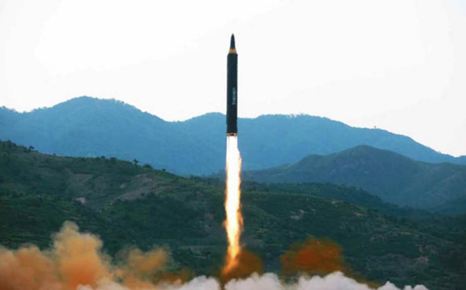 A North Korean missile is shown taking off in photos published in the North Korean newspaper Rodong Sinmun, Monday, May 15, 2017.