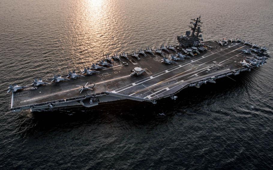 The aircraft carrier USS Ronald Reagan transits waters surrounding the Korean peninsula during Exercise Invincible Spirit in October.