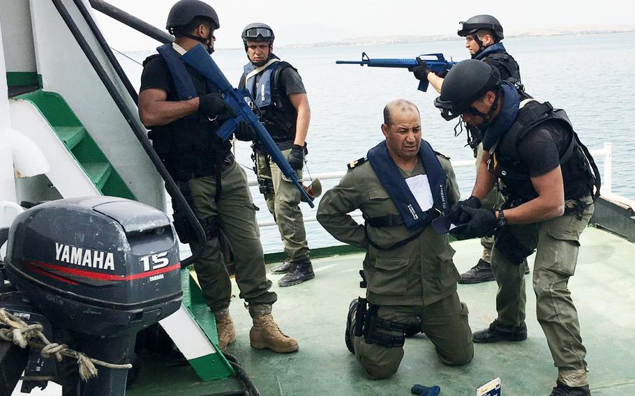 Tunisian sailors practice detaining suspects on Thursday, May 13, 2017, in Bizerte, Tunisia, during Phoenix Express.